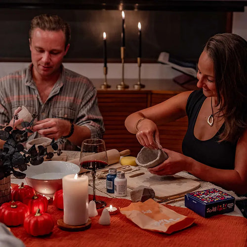 Couple sharing Halloween night with Sculpd Pottery Kit