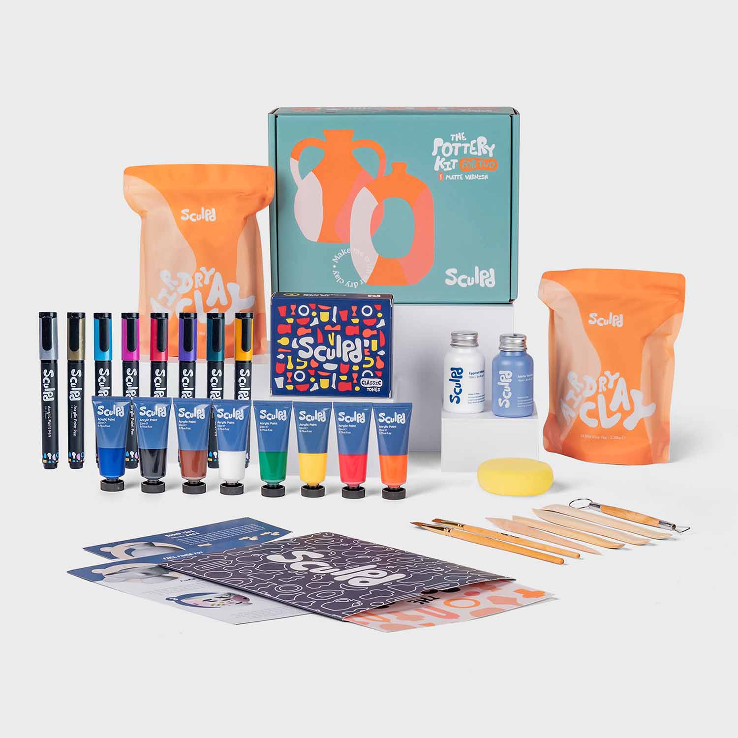 Sculpd pottery kit for two with matte varnish, classic paints, and metallic pens set