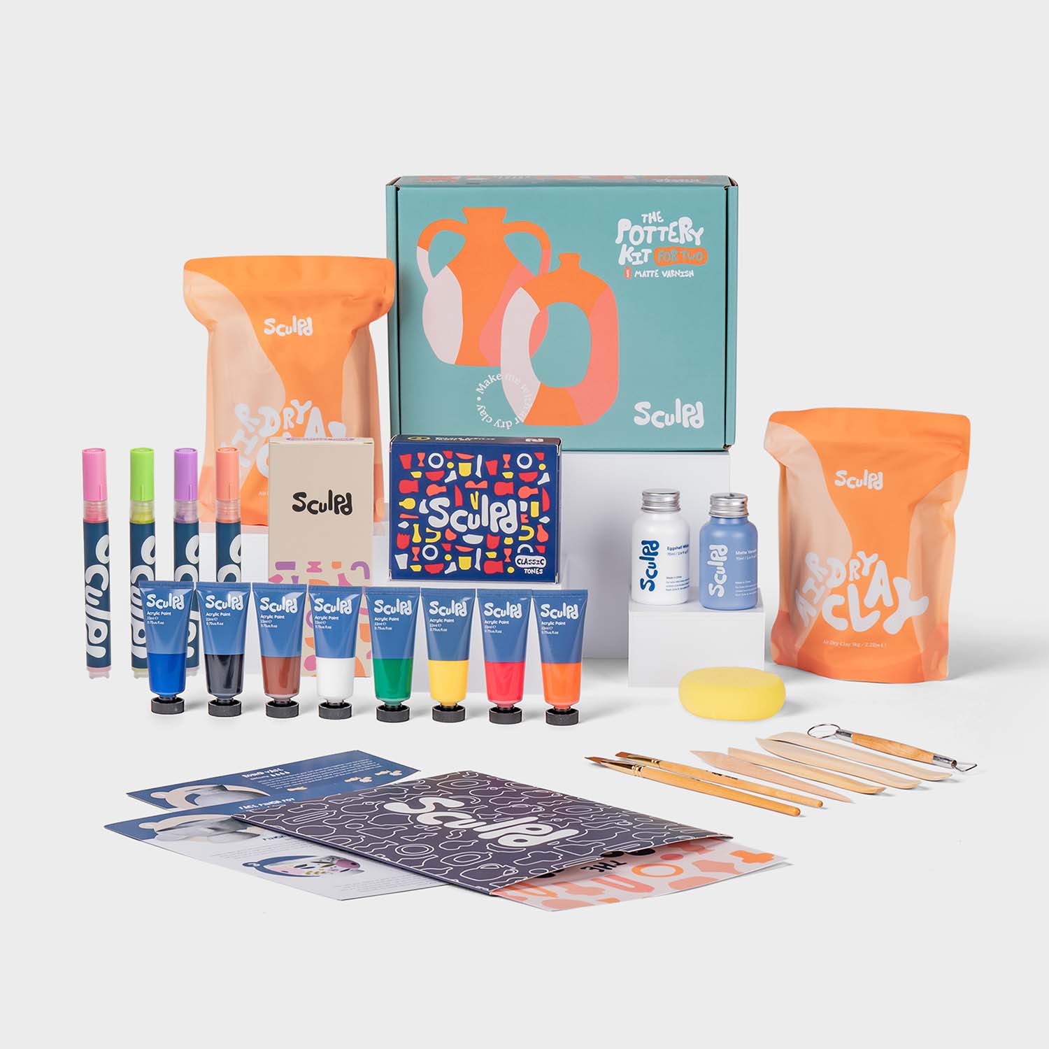 Sculpd pottery kit for two with matte varnish, classic paints, and modernist pens set