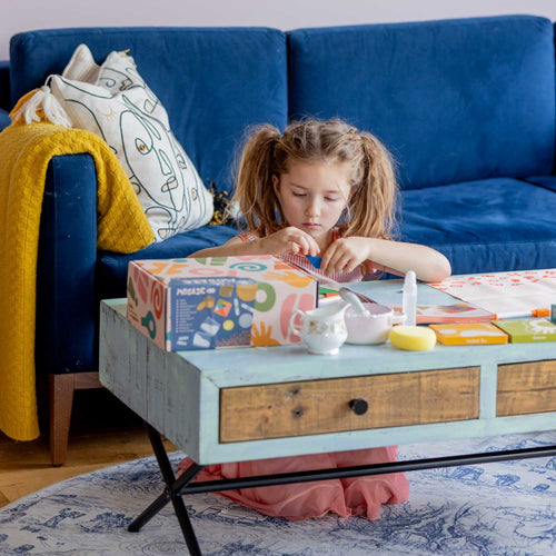 A young girl enjoying her Sculpd kids mosaic kit