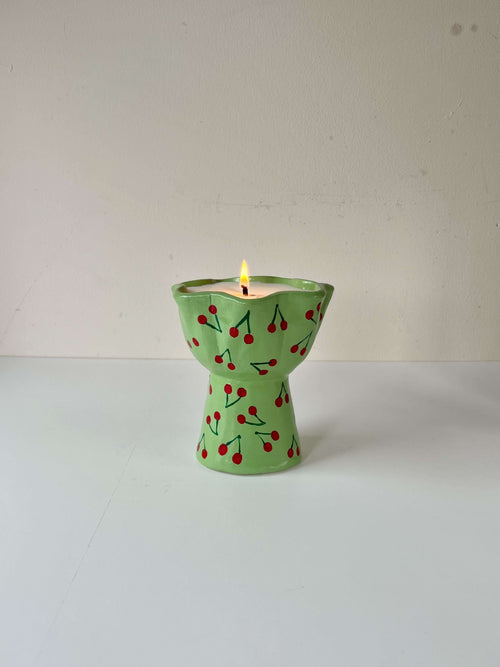 handmade soy candle on pedestal design
